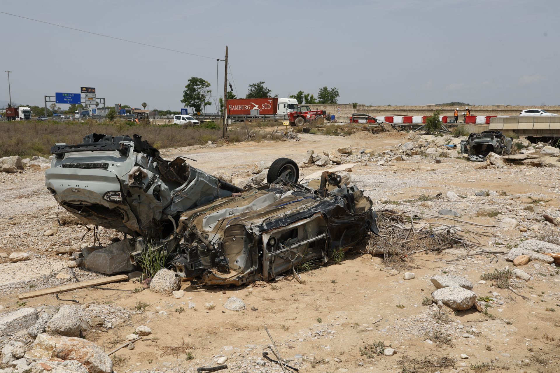 Vertedero de coches y basuras arrastrados por la Dana en el barranco del Poyo